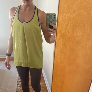 Green over sized tank with blue edges